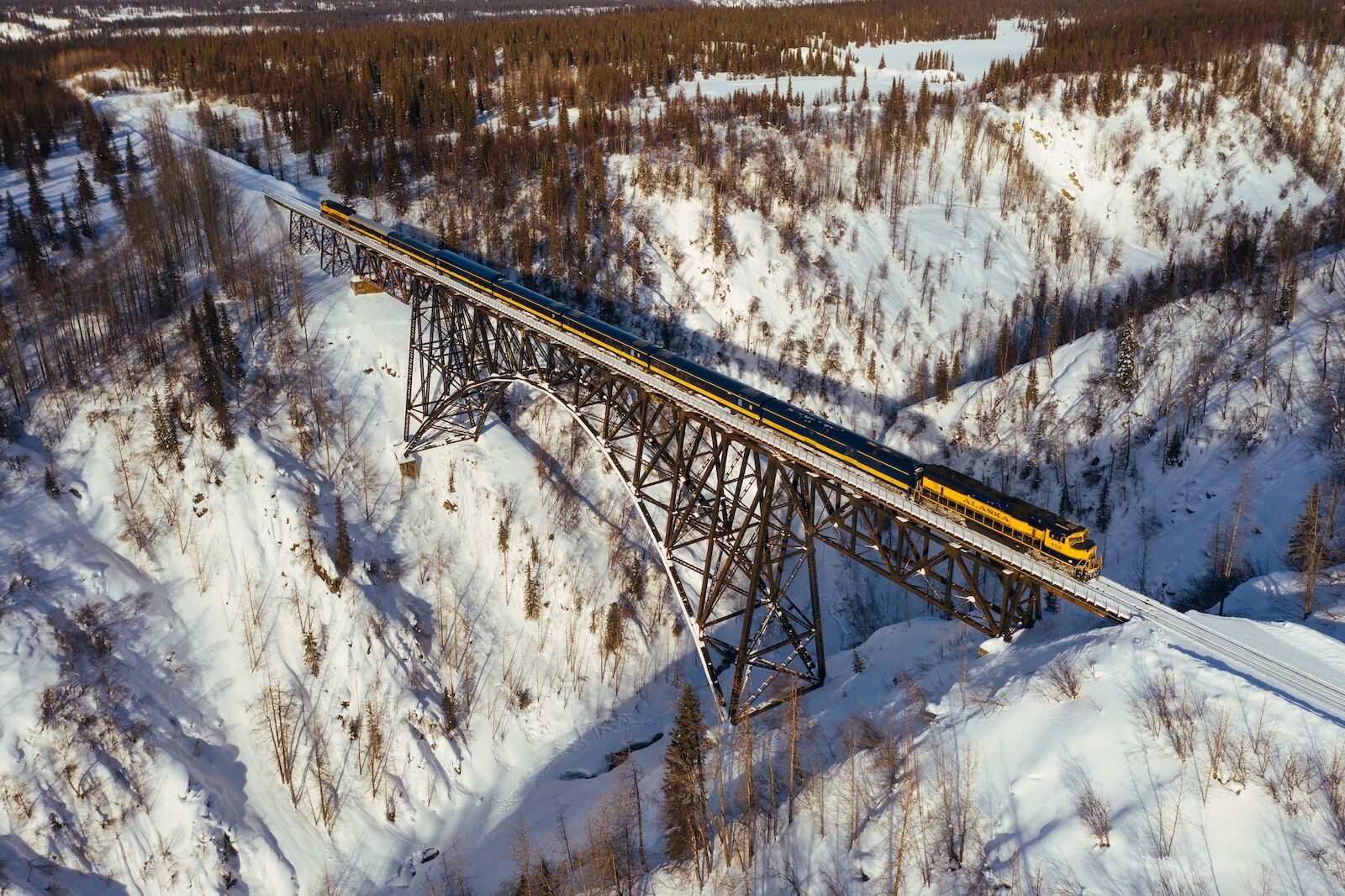 Alaska-Aurora-Winter-Train-Bridge-aerial-view