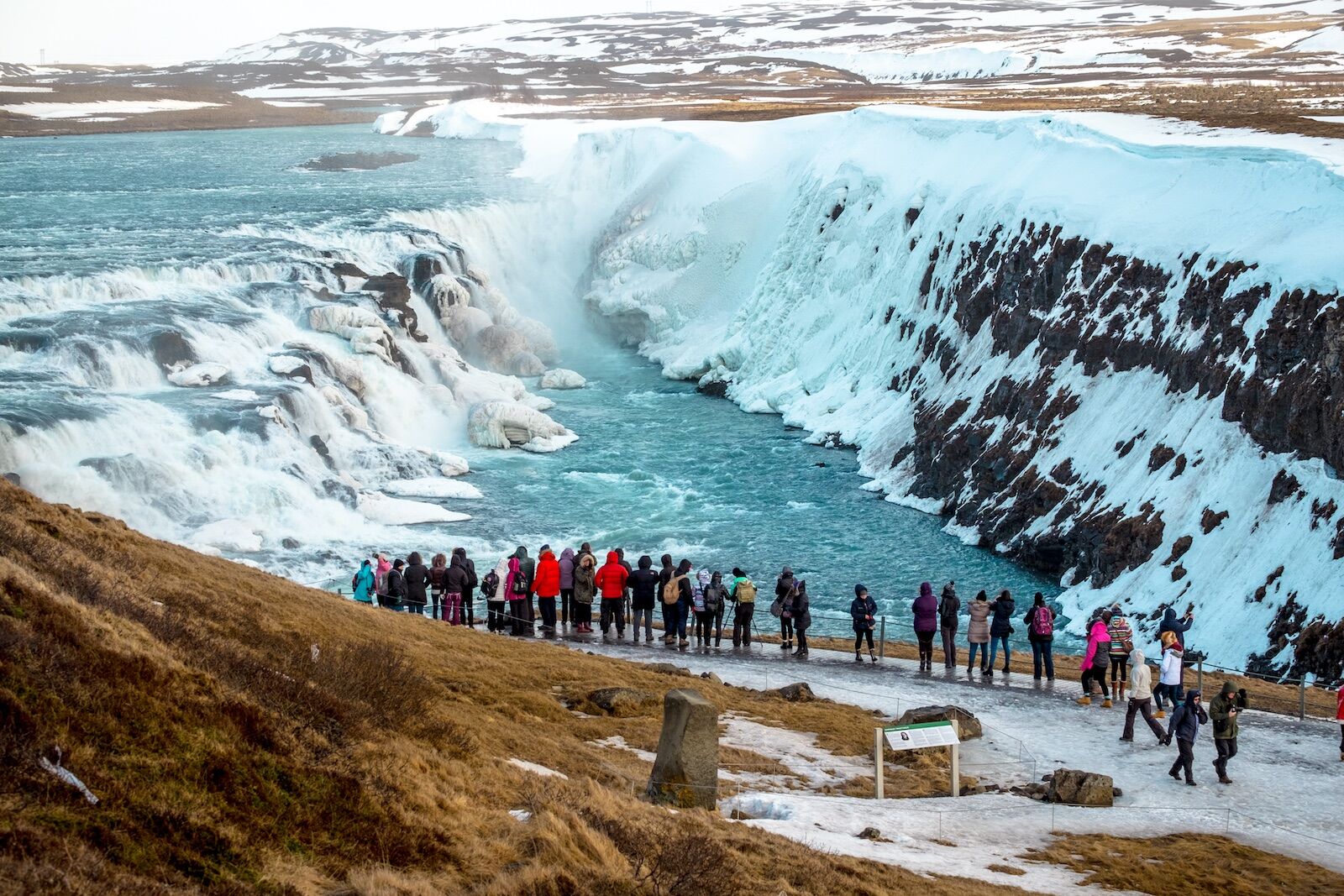 Gullfoss-Waterfalls-in-Iceland-with-people-winter