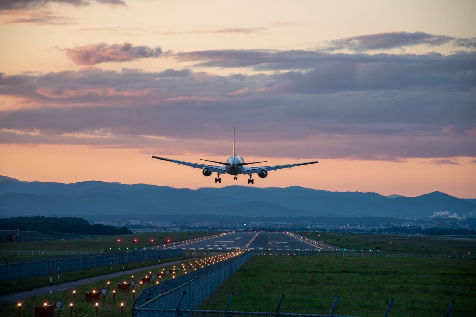 airplane-at-dusk-with-mountains-1 airplane-at-dusk-with-mountains-1