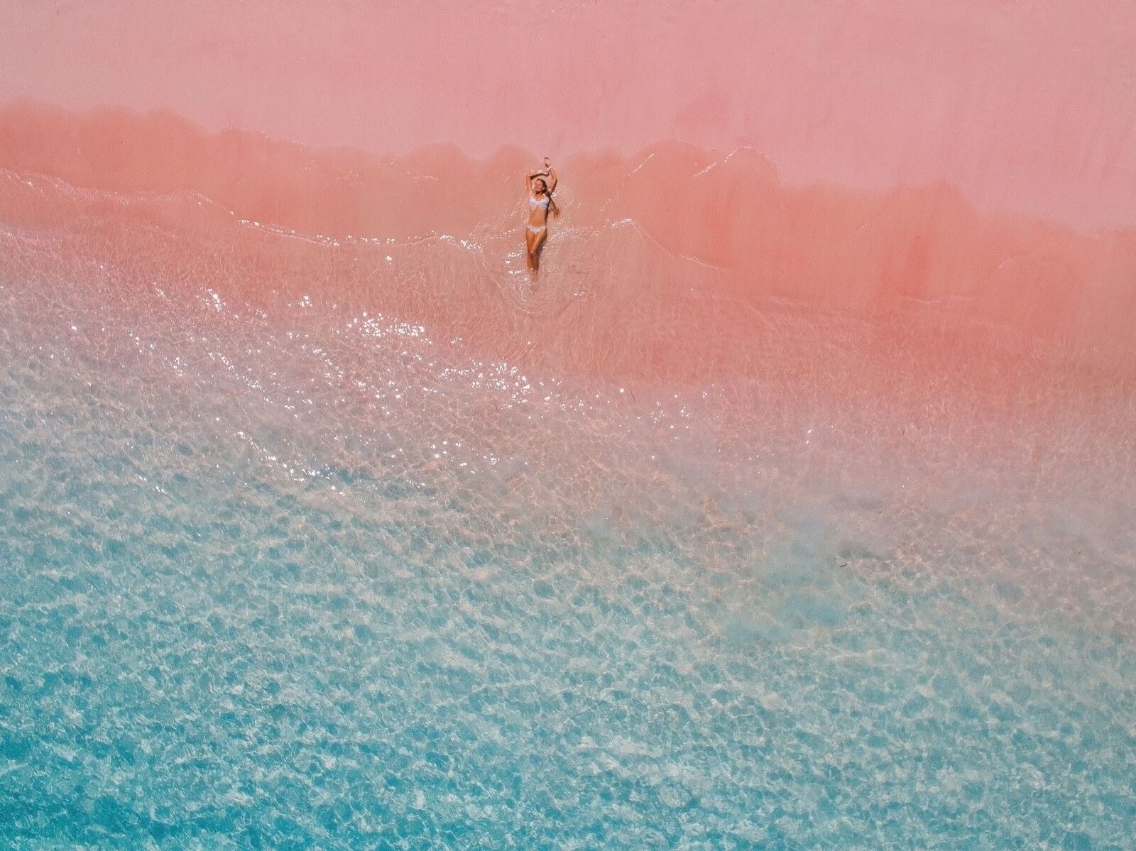 woman-on-pink-sand-beach woman-on-pink-sand-beach